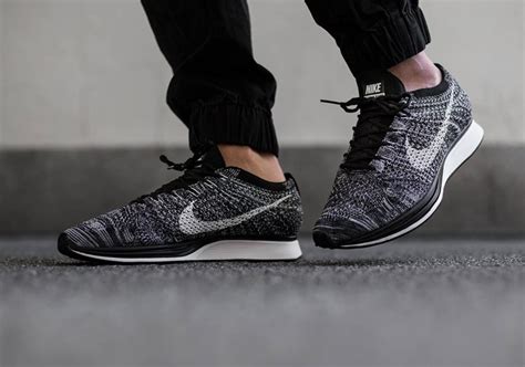 fake nike flyknit racer black white|how to spot nike flyknit trainer.